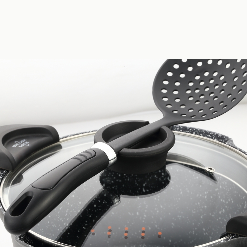 cooking knob holding a spatula